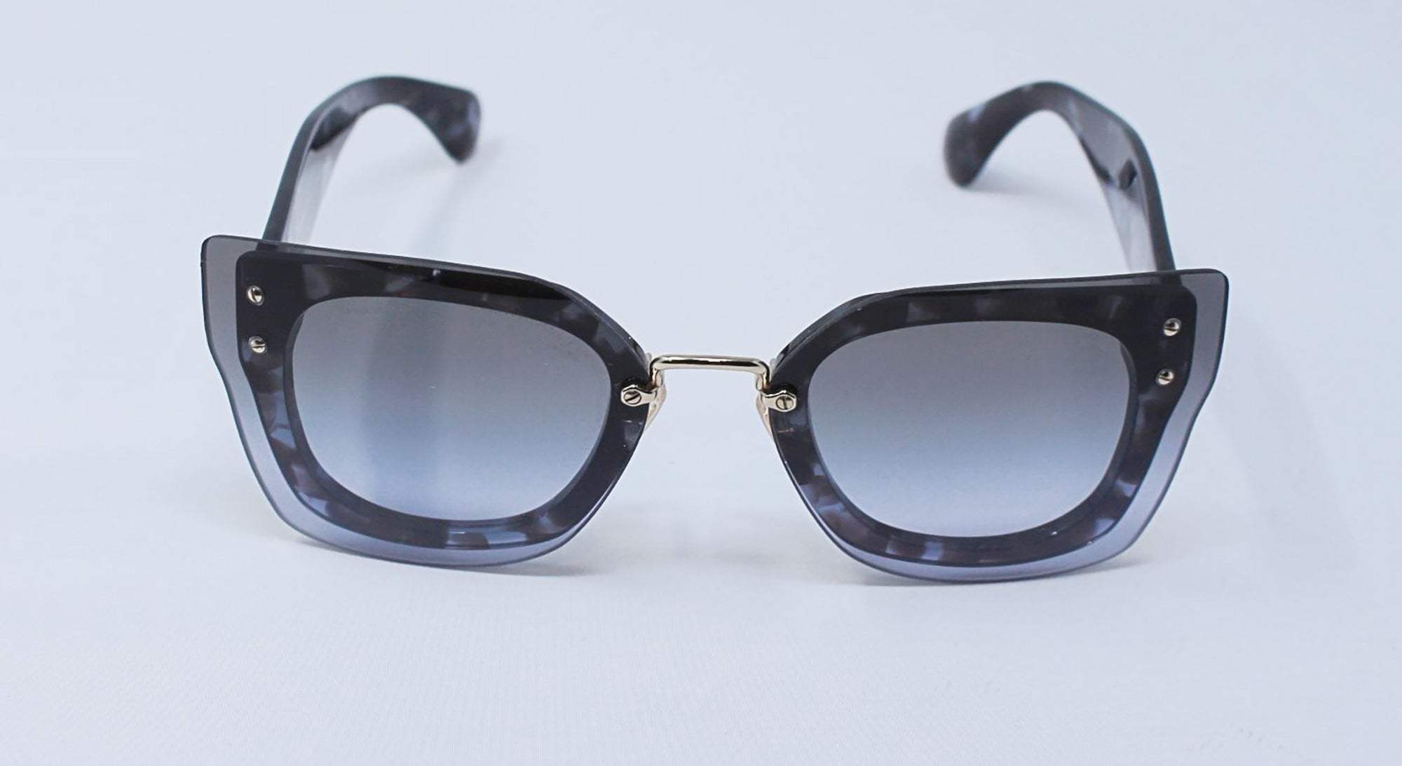 Miu Miu MU 04R UAH-3H0 - Lilac Havana-Grey by Miu Miu for Women - 67-16-140 mm Sunglasses